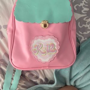 Melanie Martinez k-12 backpack couple defects